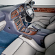 Illustration for article titled Live Your Best Life With This $450,000 Aston Martin Vantage V600 With A WWII Spitfire Boost Gauge